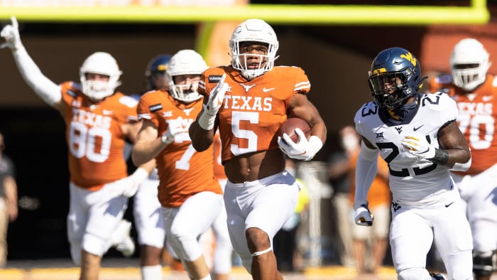 Texas's Bijan Robinson runs vs. WVU